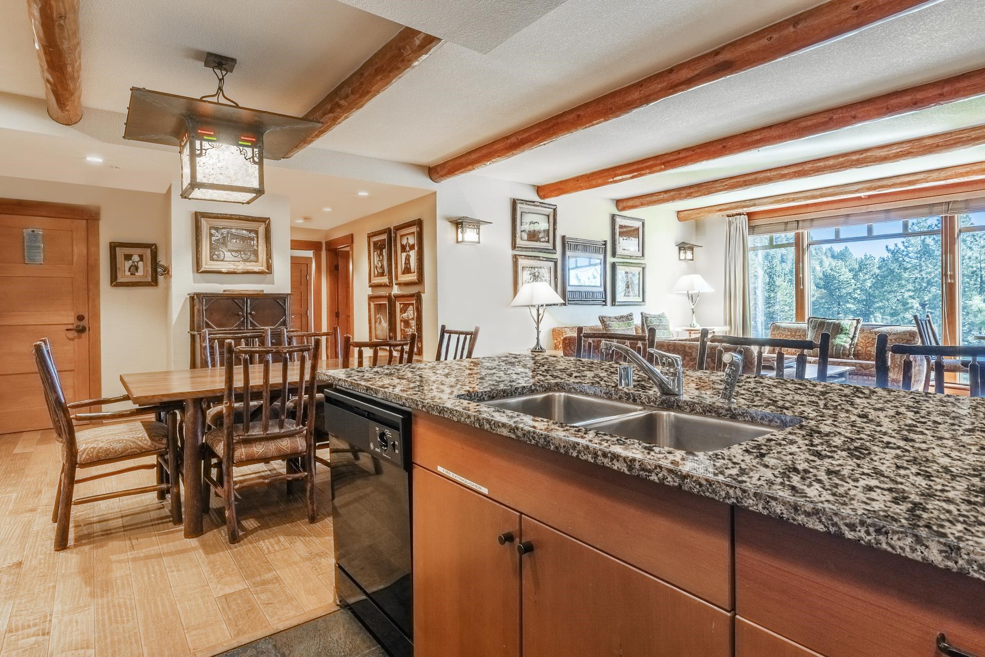6201 Minaret Road, Unit 2317 Mammoth Lakes, CA 93546 - Photo 18 of 44 a view of a dining room with furniture window and outside view
