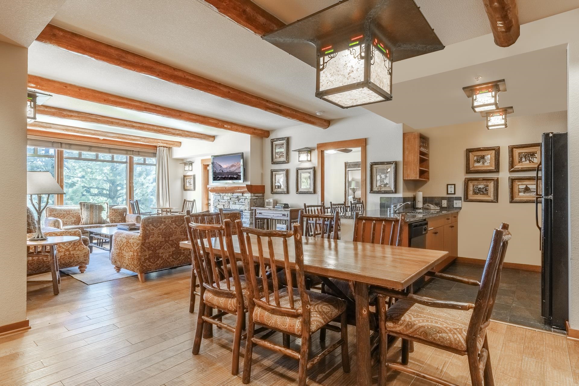 6201 Minaret Road, Unit 2317 Mammoth Lakes, CA 93546 - Photo 6 of 44 a view of a dining room with furniture window and wooden floor