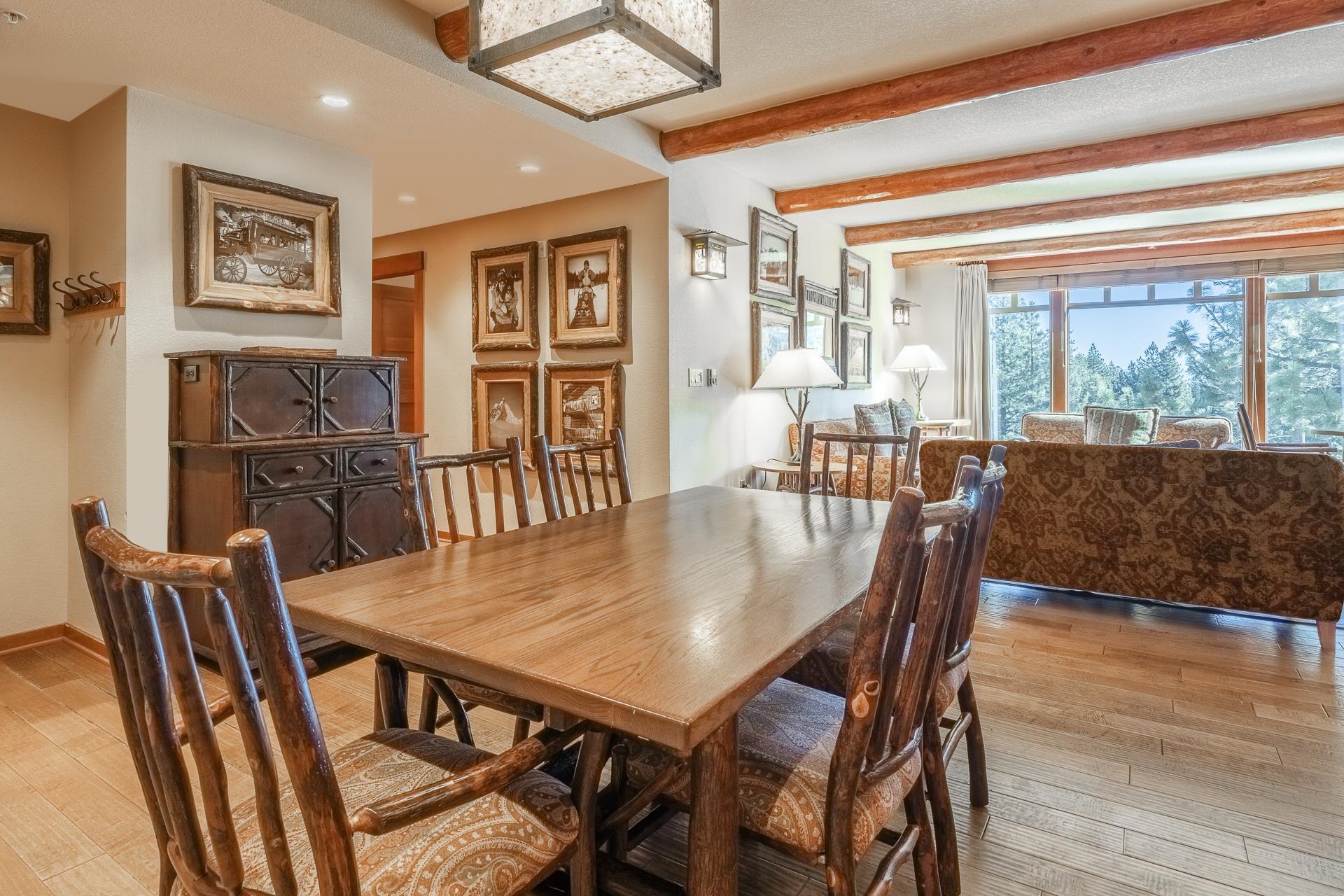 6201 Minaret Road, Unit 2317 Mammoth Lakes, CA 93546 - Photo 7 of 44 a view of a dining room with furniture window and wooden floor