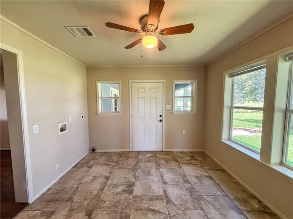 a view of an empty room with window