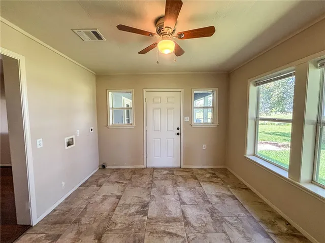 a view of an empty room with window