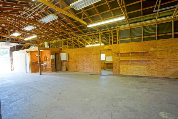 a view of a yard and an ocean view