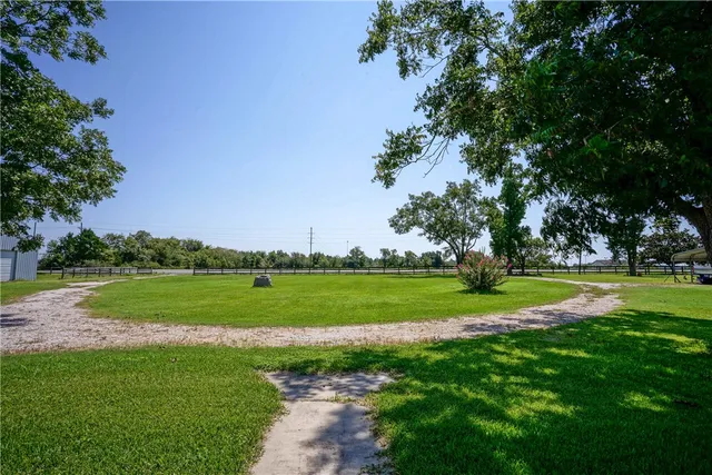 a view of a back yard of the house