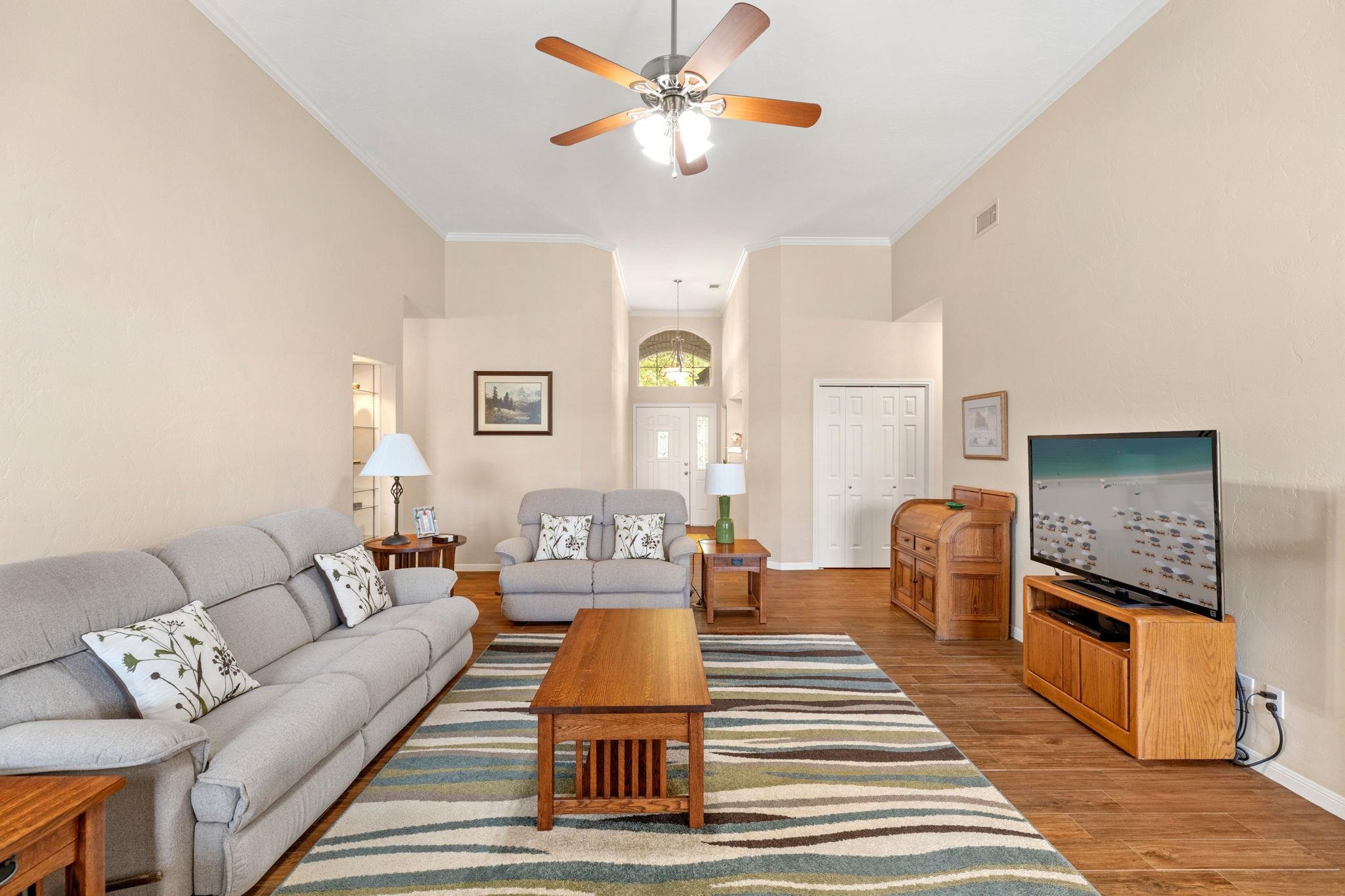 129 Web Isle Drive Granite Shoals, TX 78654 - Photo 11 of 30 a living room with furniture and wooden floor