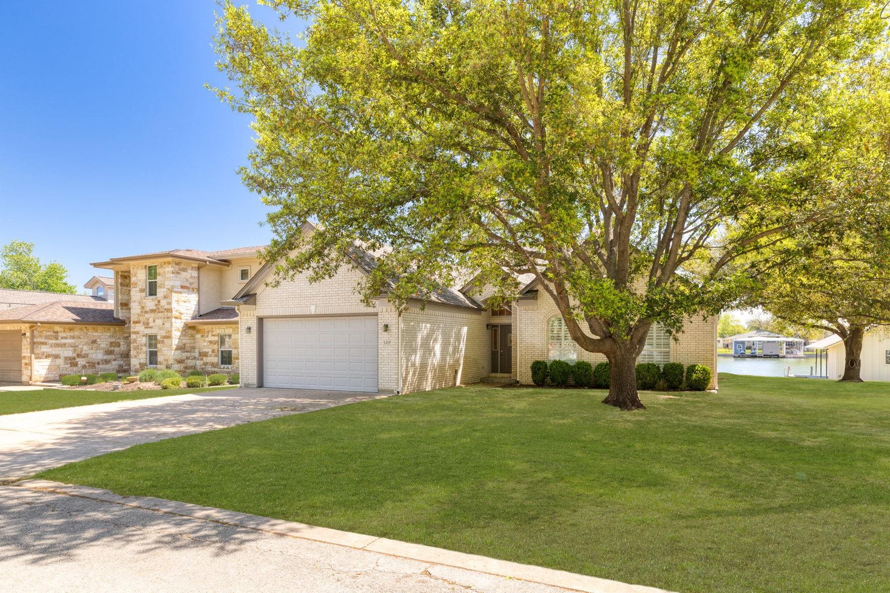 129 Web Isle Drive Granite Shoals, TX 78654 - Photo 2 of 30 a front view of house with yard and green space