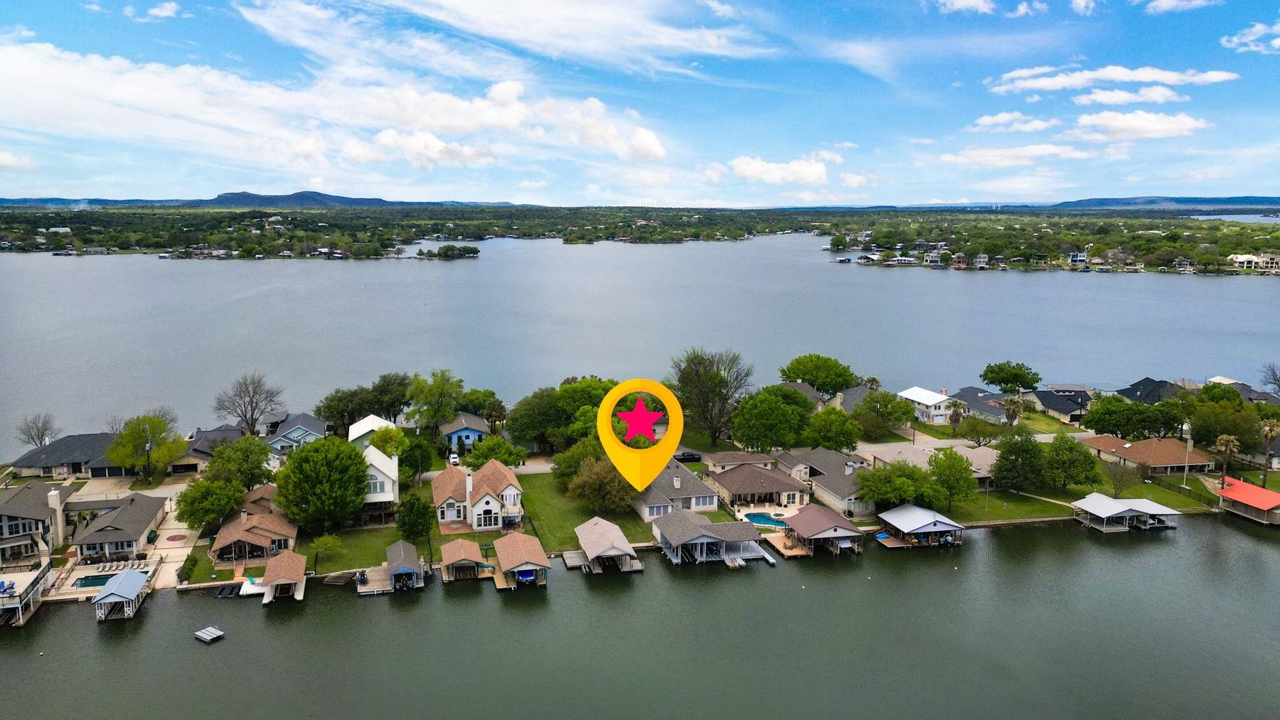 129 Web Isle Drive Granite Shoals, TX 78654 - Photo 4 of 30 a view of a lake with houses