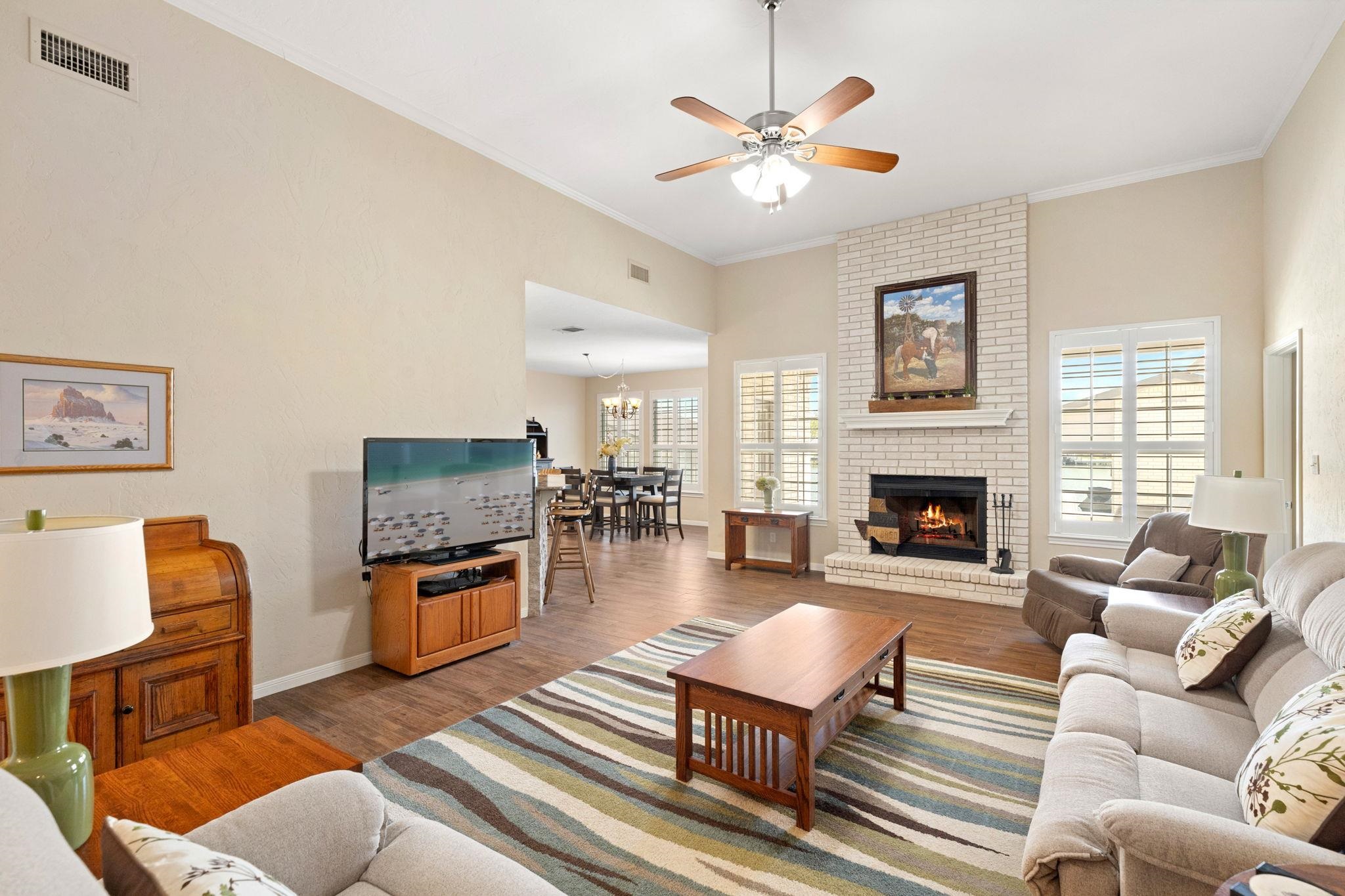 129 Web Isle Drive Granite Shoals, TX 78654 - Photo 10 of 30 a living room with furniture and a fireplace