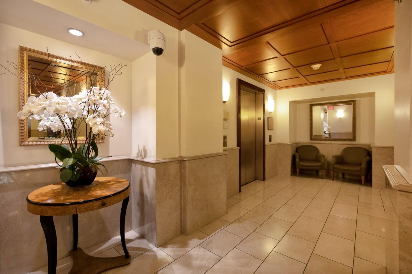 1483 Sutter Street, Unit 1101 San Francisco, CA 94109 - Photo 22 of 39 a lobby room with furniture and a potted plant