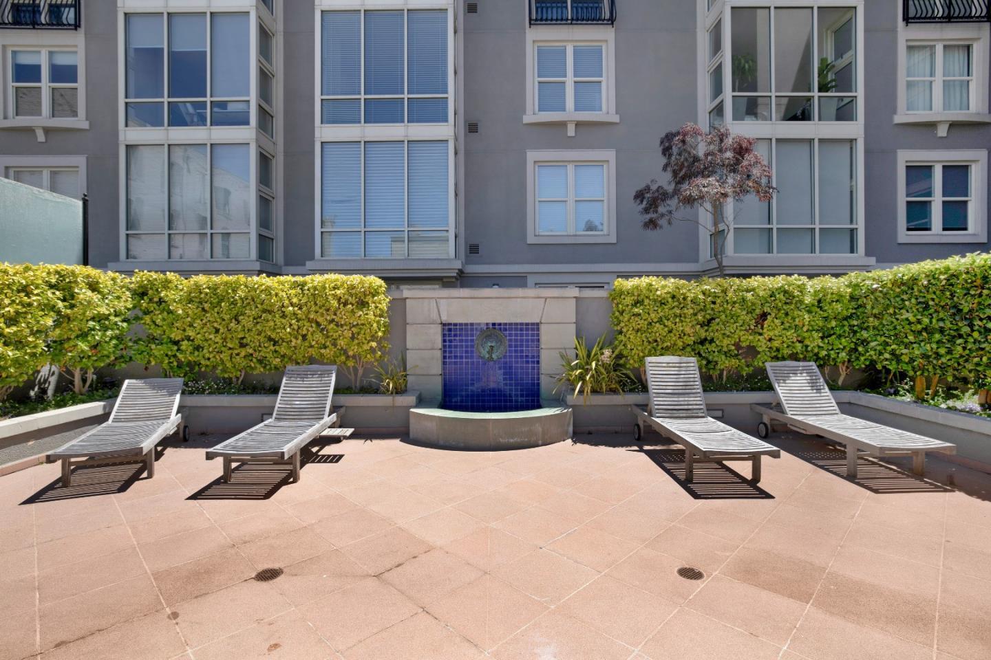 1483 Sutter Street, Unit 1101 San Francisco, CA 94109 - Photo 35 of 39 a building outdoor space with patio furniture and potted plants