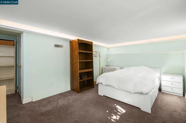 a kitchen with a stove and a refrigerator