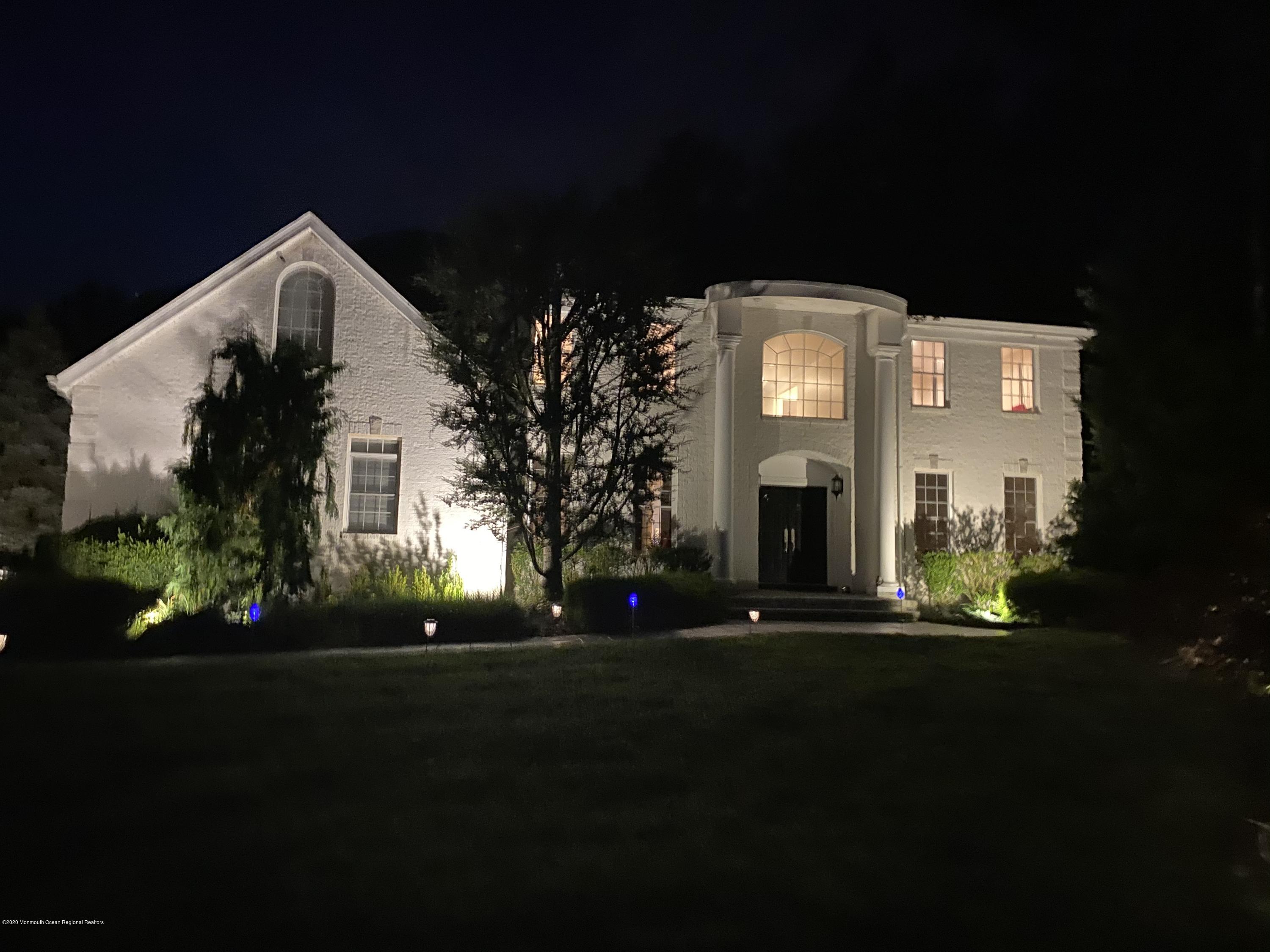 436 Stagecoach Road Millstone Township, NJ 08510 - Photo 24 of 97 a front view of a house with a yard