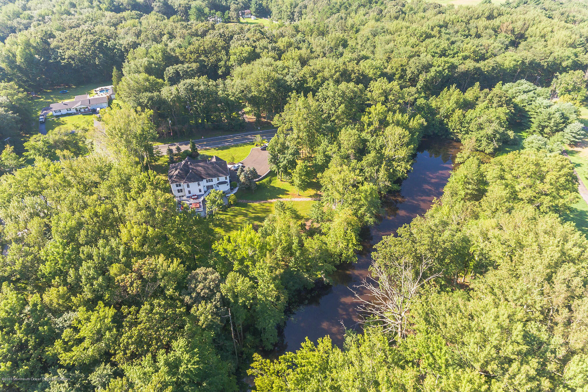436 Stagecoach Road Millstone Township, NJ 08510 - Photo 4 of 97 a view of a garden with plants