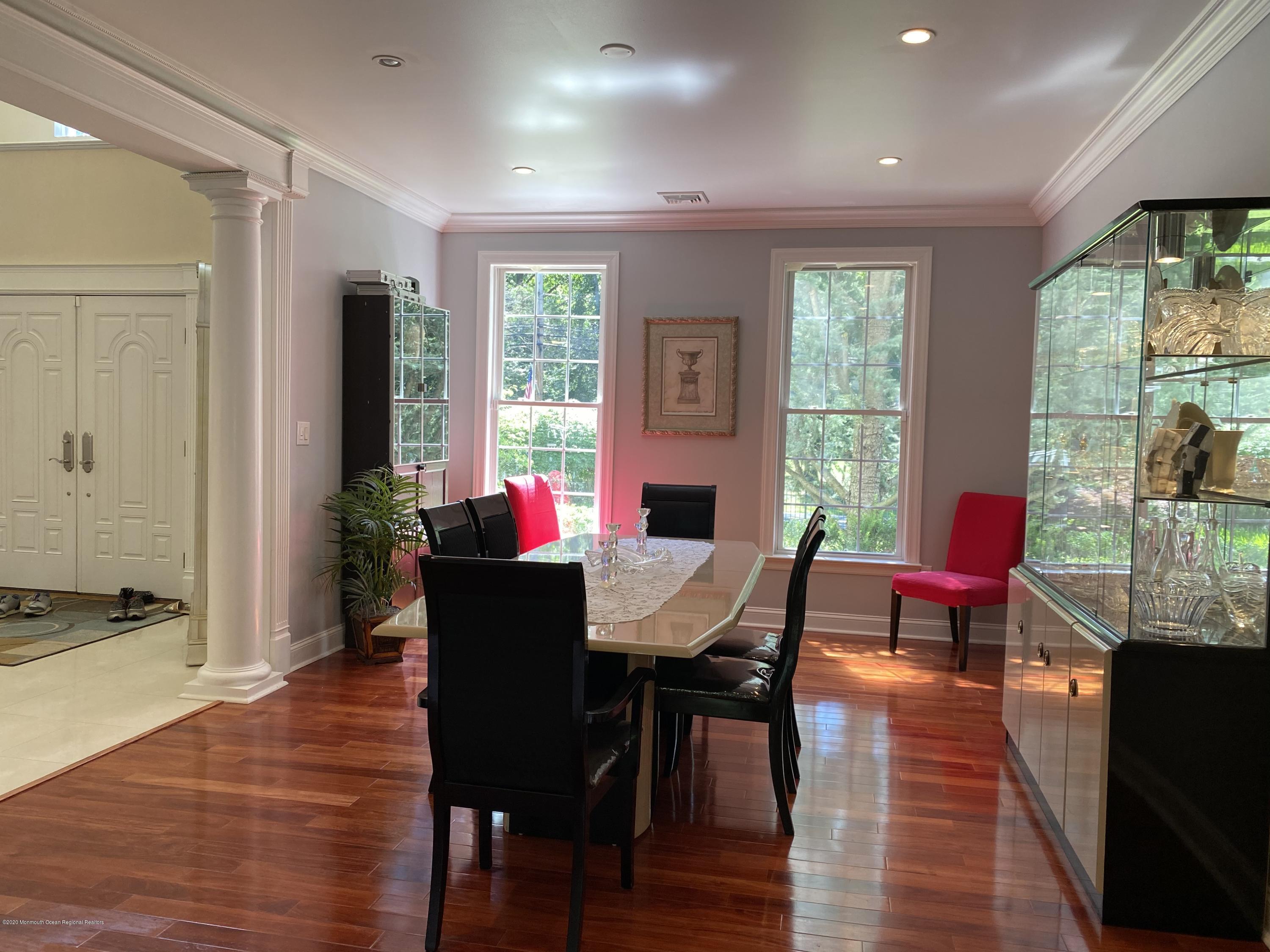 436 Stagecoach Road Millstone Township, NJ 08510 - Photo 31 of 97 a dining room with furniture and wooden floor