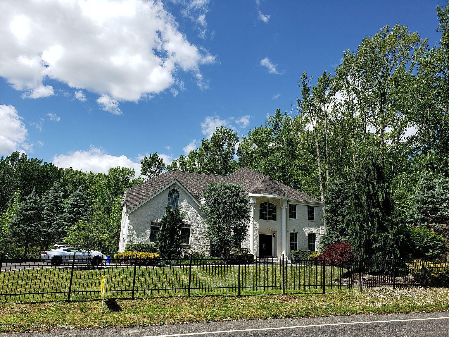 436 Stagecoach Road Millstone Township, NJ 08510 - Photo 5 of 97 a front view of a house with a yard