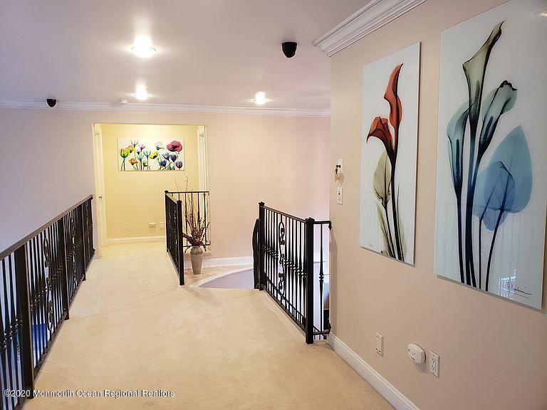 436 Stagecoach Road Millstone Township, NJ 08510 - Photo 47 of 97 a view of a hallway with stairs
