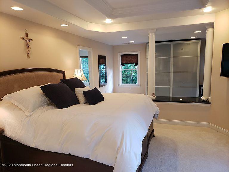 436 Stagecoach Road Millstone Township, NJ 08510 - Photo 51 of 97 a bed room with a bed and a large window