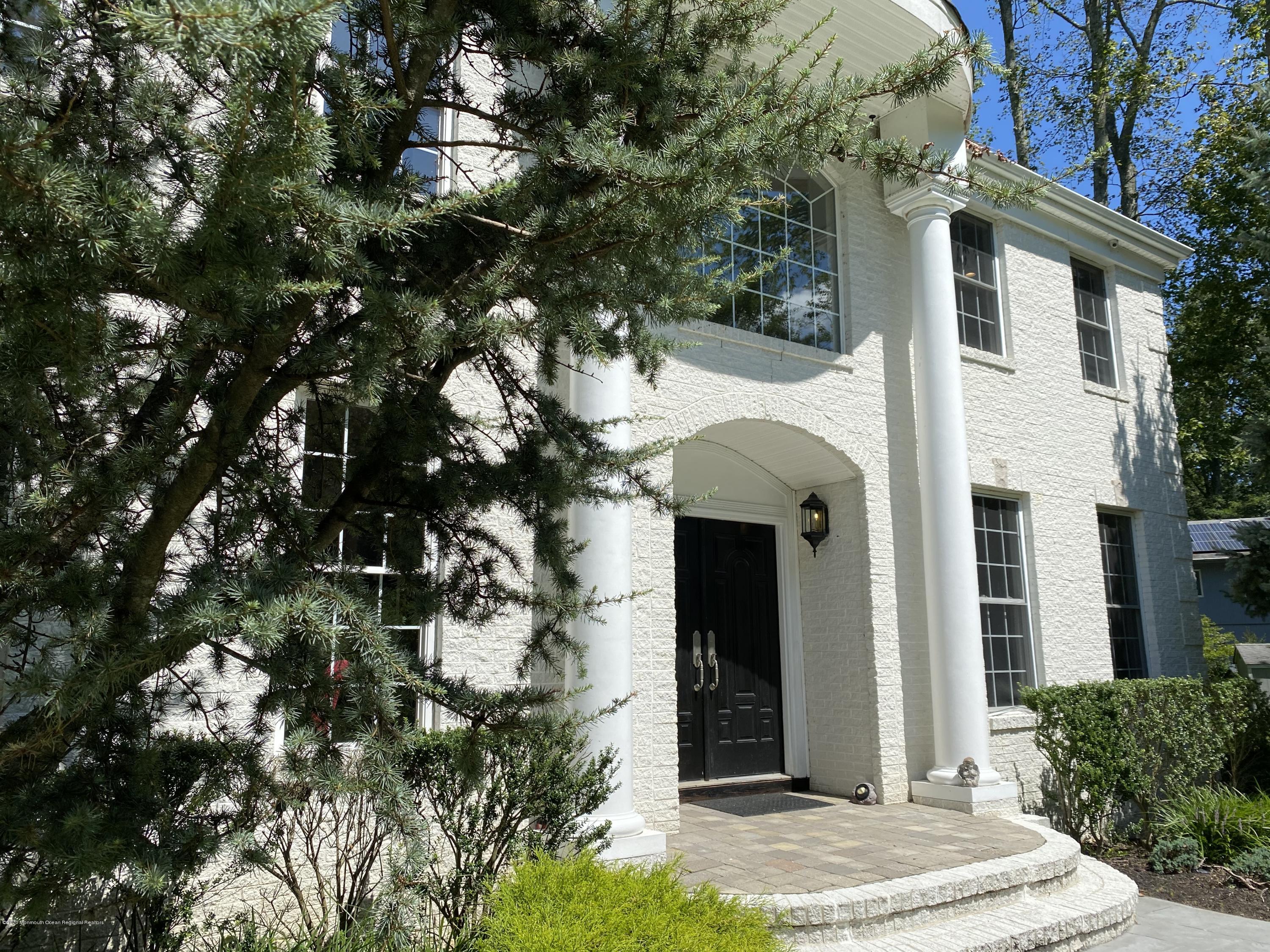 436 Stagecoach Road Millstone Township, NJ 08510 - Photo 7 of 97 a front view of a house with a yard