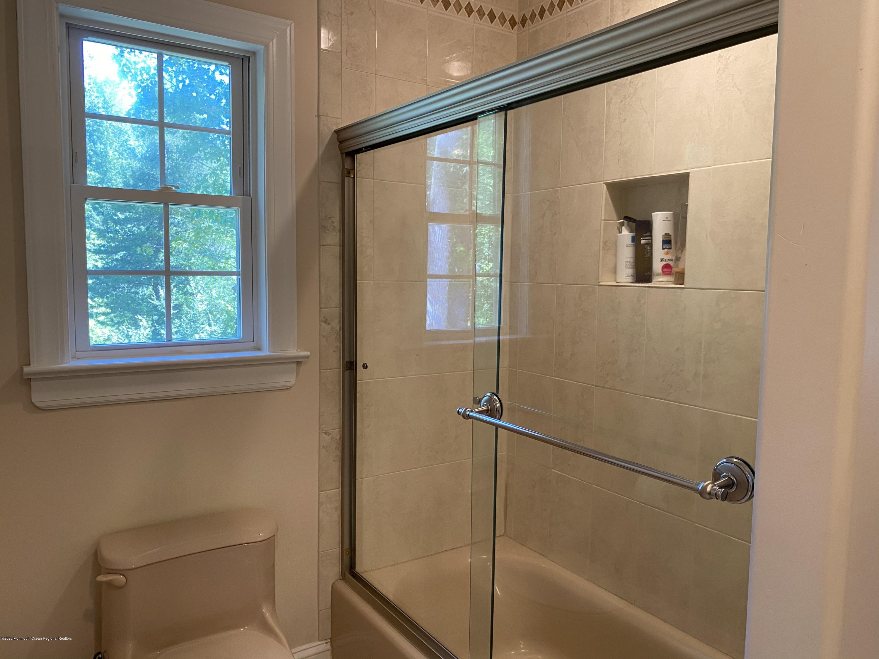 436 Stagecoach Road Millstone Township, NJ 08510 - Photo 63 of 97 a bathroom with a toilet and a shower