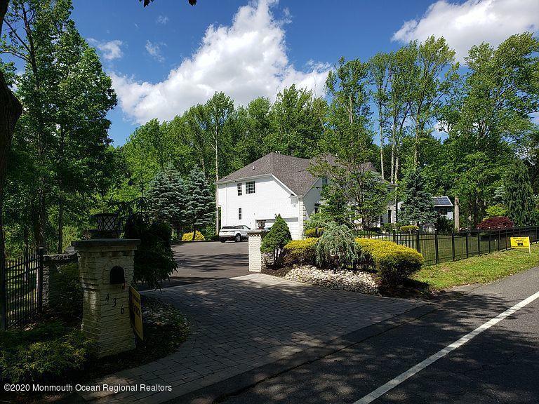 436 Stagecoach Road Millstone Township, NJ 08510 - Photo 74 of 97 a front view of a house with garden