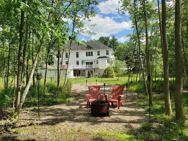 436 Stagecoach Road Millstone Township, NJ 08510 - Photo 79 of 97 a view of a patio in the backyard of house