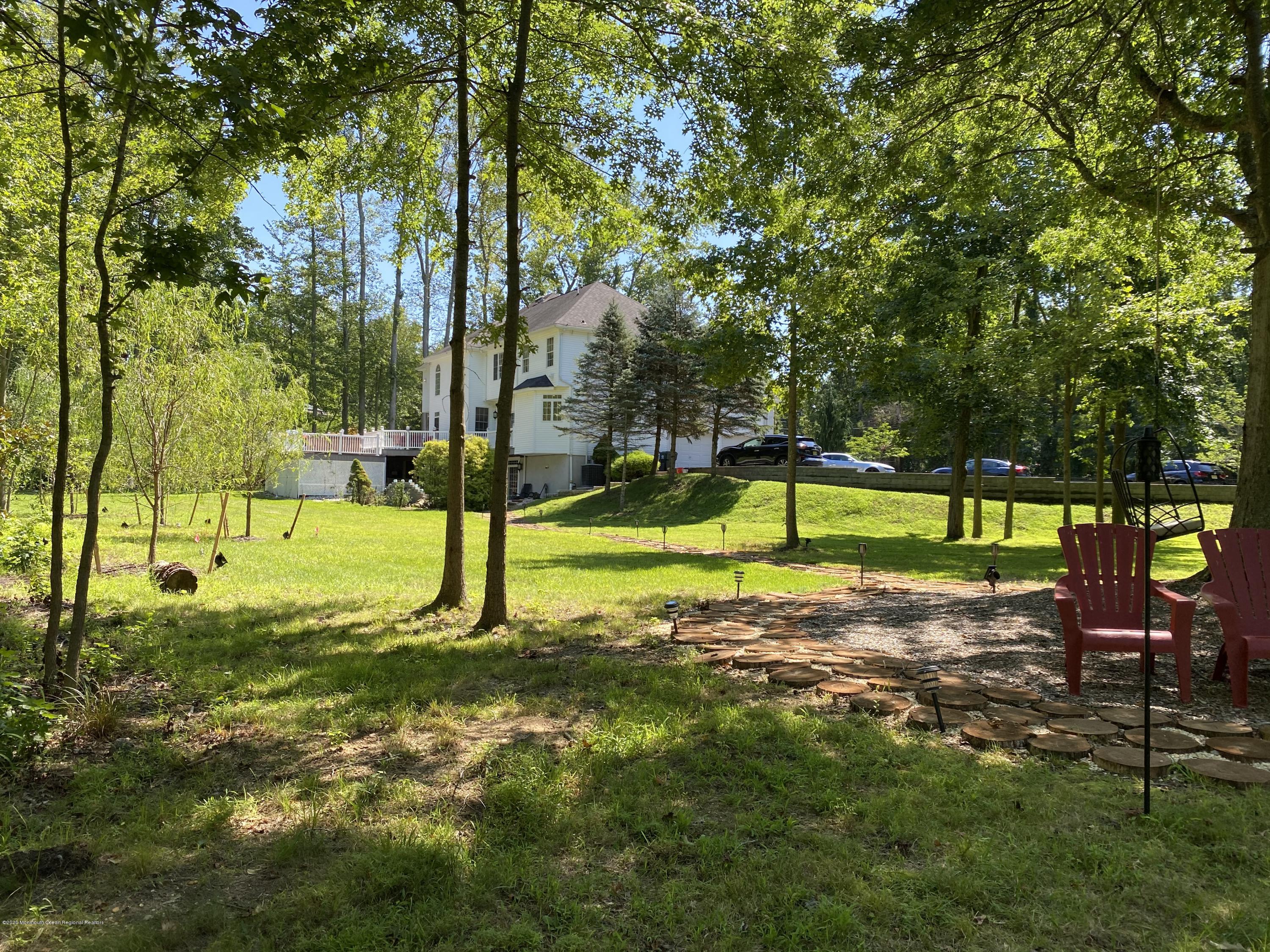 436 Stagecoach Road Millstone Township, NJ 08510 - Photo 81 of 97 a view of a park with large trees