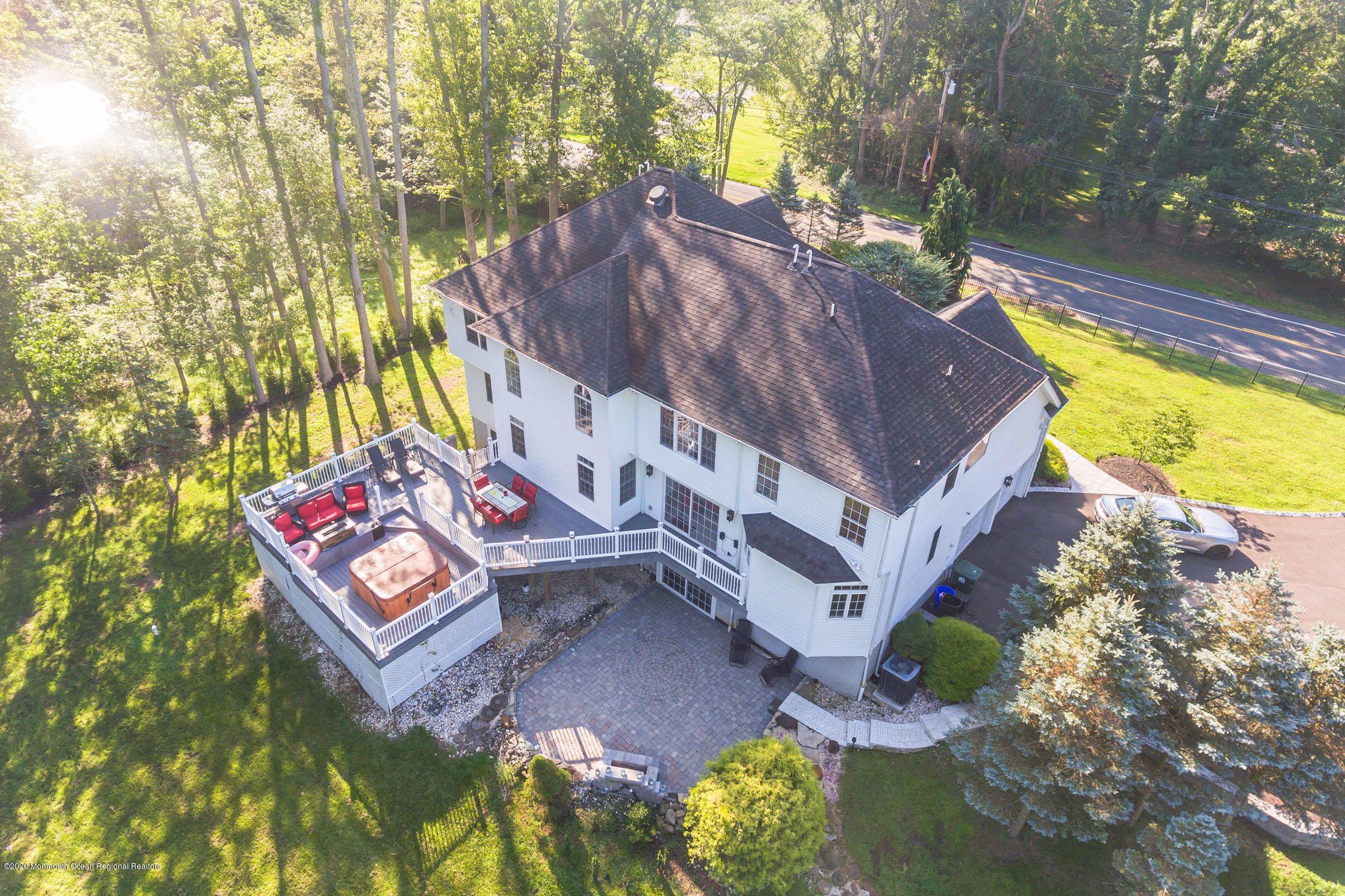 436 Stagecoach Road Millstone Township, NJ 08510 - Photo 10 of 97 a aerial view of a house with swimming pool lawn chairs and a fire pit