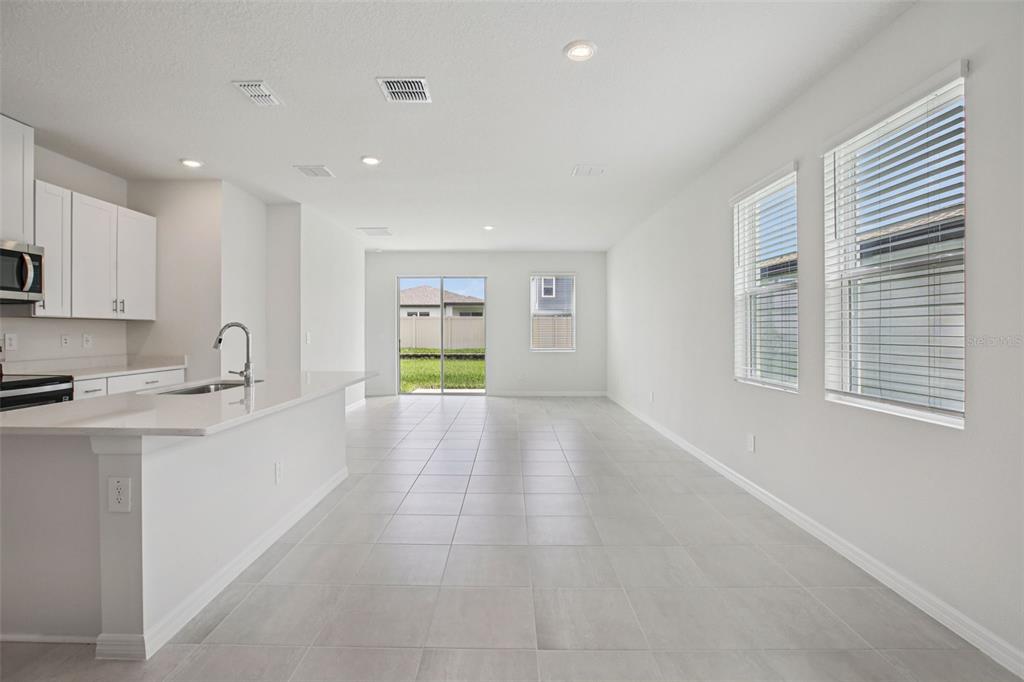 1820 Brekey Way Zephyrhills, FL 33541 - Photo 12 of 41 a view of a kitchen with a sink and a window