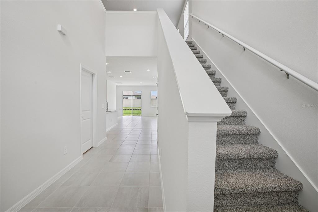 1820 Brekey Way Zephyrhills, FL 33541 - Photo 20 of 41 a view of entryway and hall with wooden floor