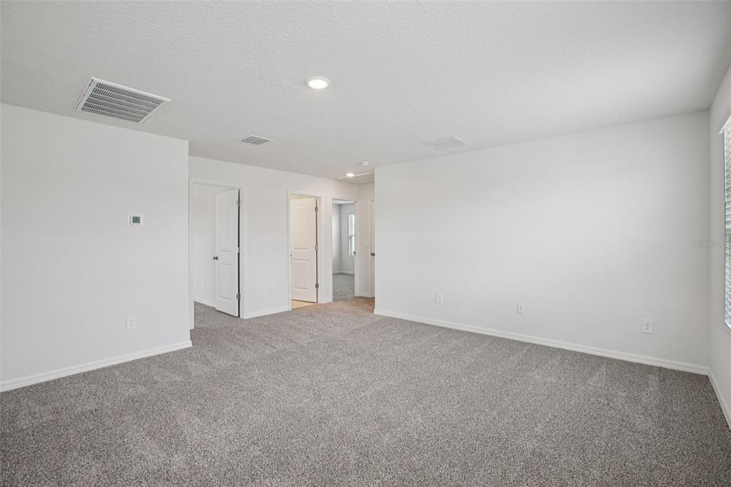 1820 Brekey Way Zephyrhills, FL 33541 - Photo 27 of 41 a view of an empty room
