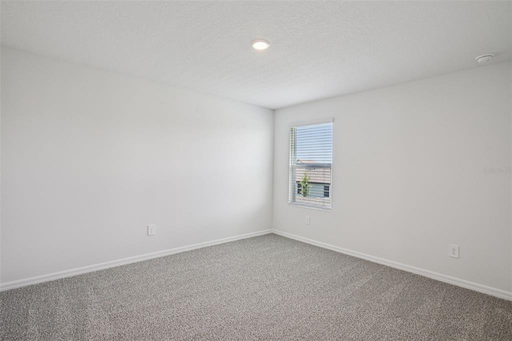 1820 Brekey Way Zephyrhills, FL 33541 - Photo 33 of 41 an empty room with a window