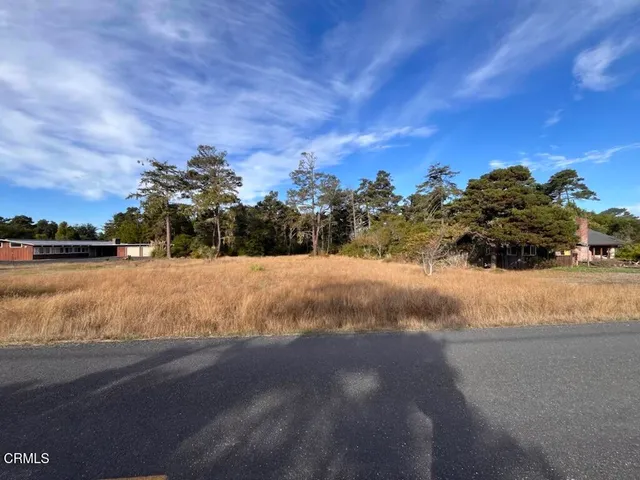 a view of swimming pool and mountain in the back