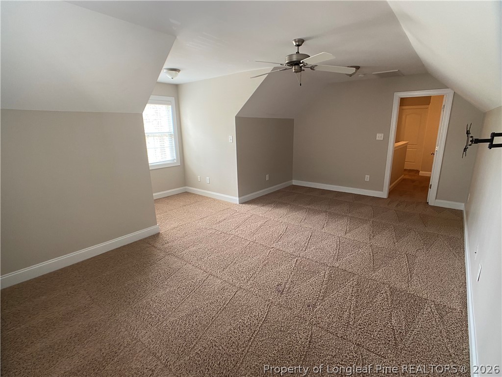 56 Orchard Falls Drive Spring Lake, NC 28390 - Photo 17 of 24 an empty room with windows and fan