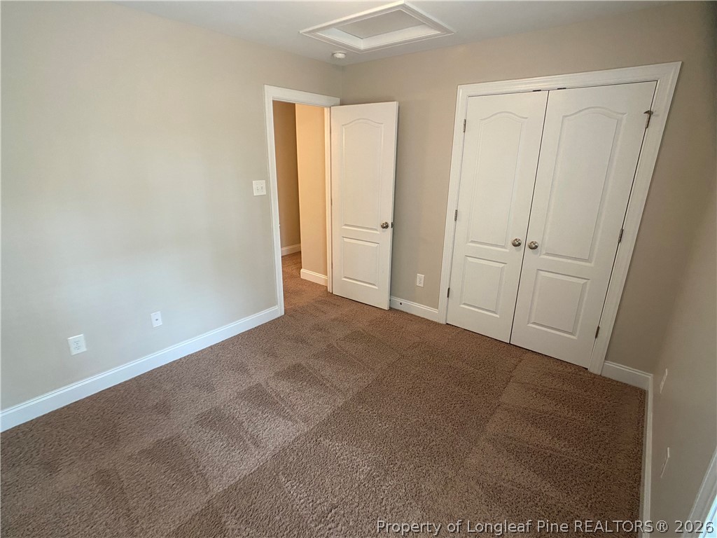 56 Orchard Falls Drive Spring Lake, NC 28390 - Photo 18 of 24 a view of an empty room