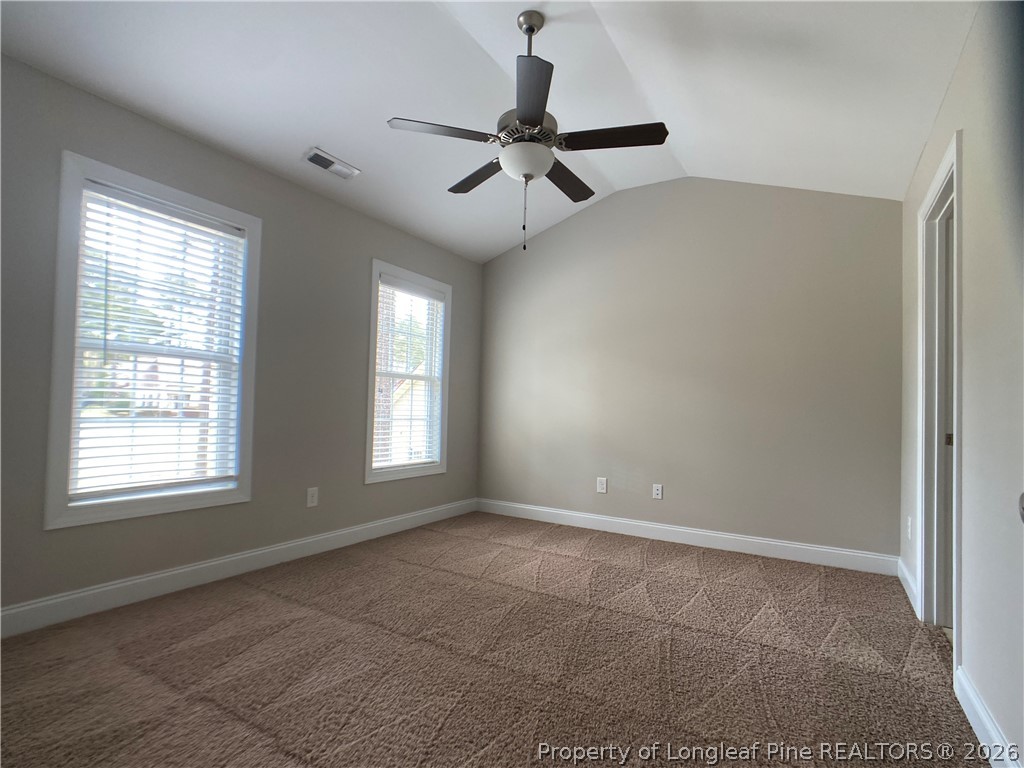 56 Orchard Falls Drive Spring Lake, NC 28390 - Photo 20 of 24 a view of an empty room with a window