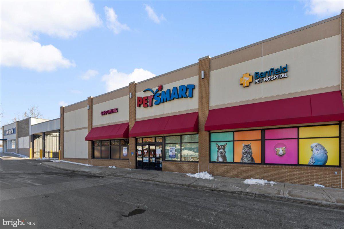 174 A Chevy Chase Street, Unit 174A Gaithersburg, MD 20878 - Photo 27 of 34 a street sign on a street corner