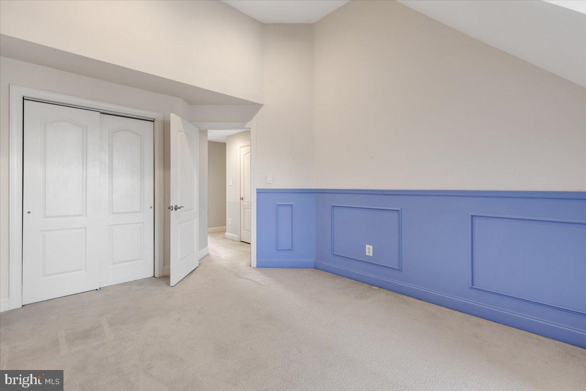 174 A Chevy Chase Street, Unit 174A Gaithersburg, MD 20878 - Photo 10 of 34 a view of an empty room and entryway