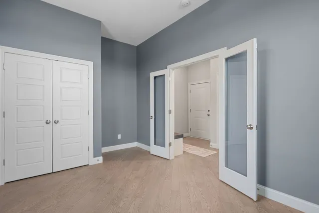 a bathroom with a sink a vanity and a mirror