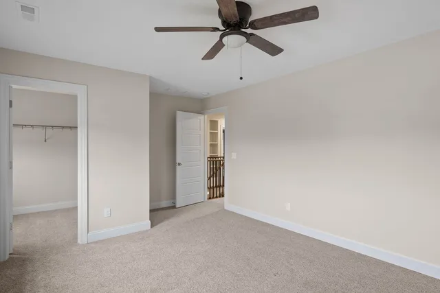 a view of cabinets with washer and dryer