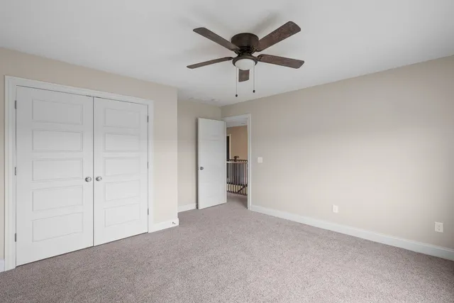 a view of a balcony with wooden floor