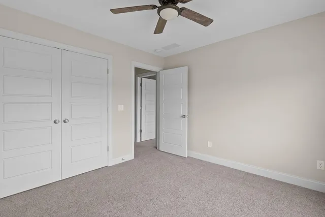 a house view with swimming pool and porch