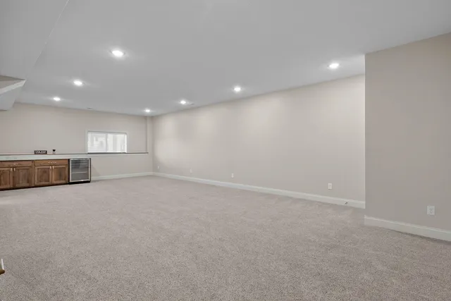 an aerial view of a house with a garden