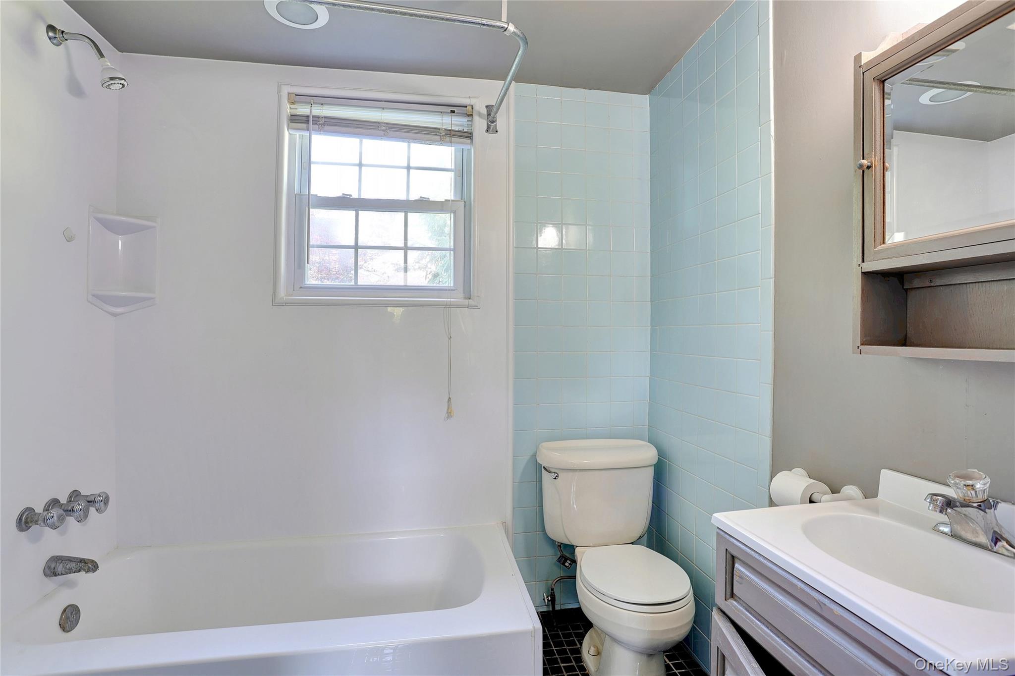 500 Haverstraw Road Suffern, NY 10901 - Photo 17 of 36 a white toilet sitting next to a bath tub