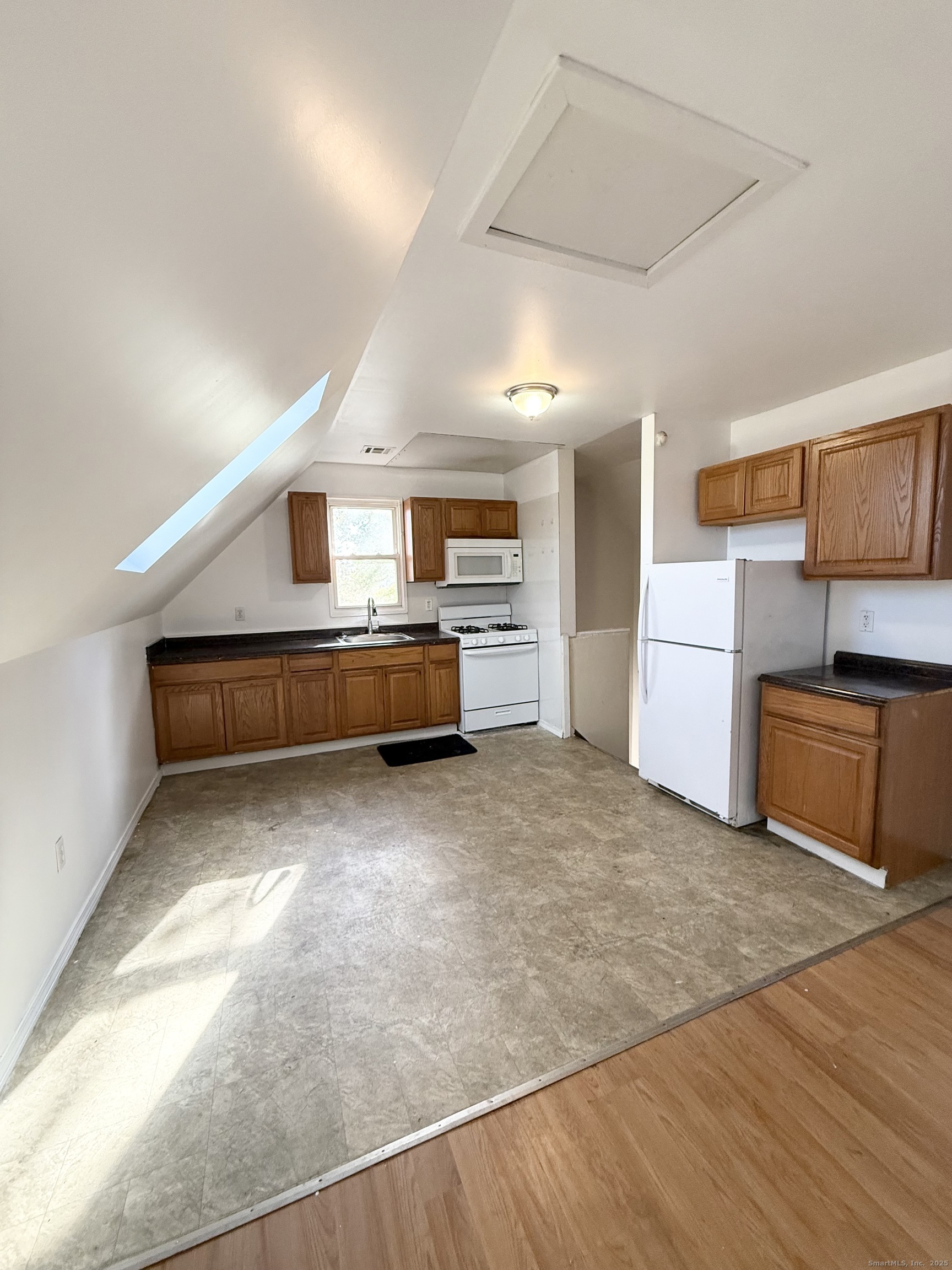 342 Exchange Street New Haven, CT 06513 - Photo 3 of 9 a view of kitchen with furniture and stainless steel appliances