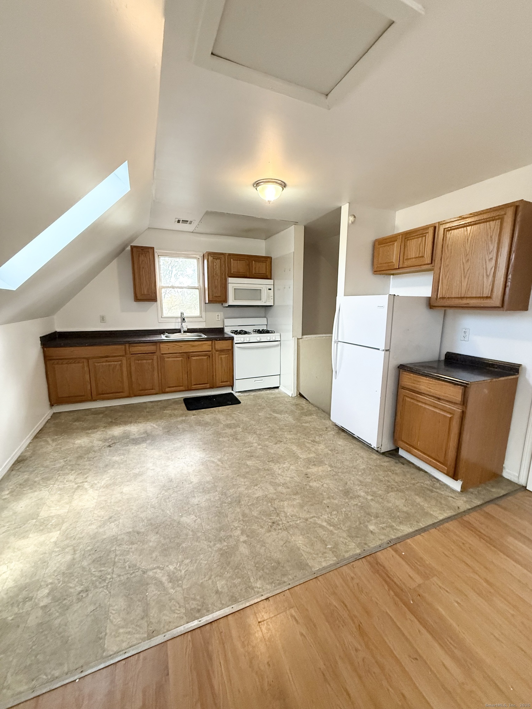 342 Exchange Street New Haven, CT 06513 - Photo 8 of 9 a room with a bed and furniture