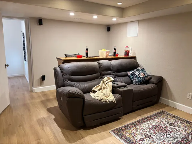 a dining room with a table and chairs
