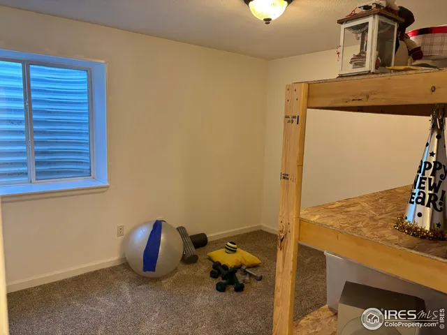 a living room with a rug