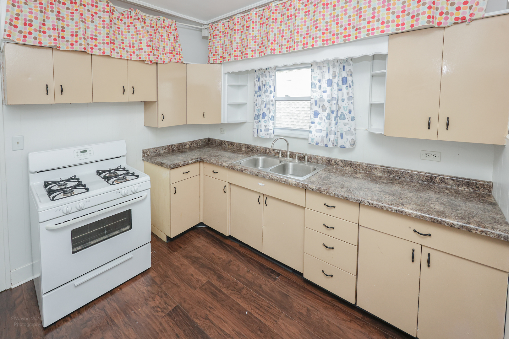 815 Mason Avenue, Unit 2 Joliet, IL 60435 - Photo 11 of 13 a kitchen with granite countertop white cabinets and white appliances