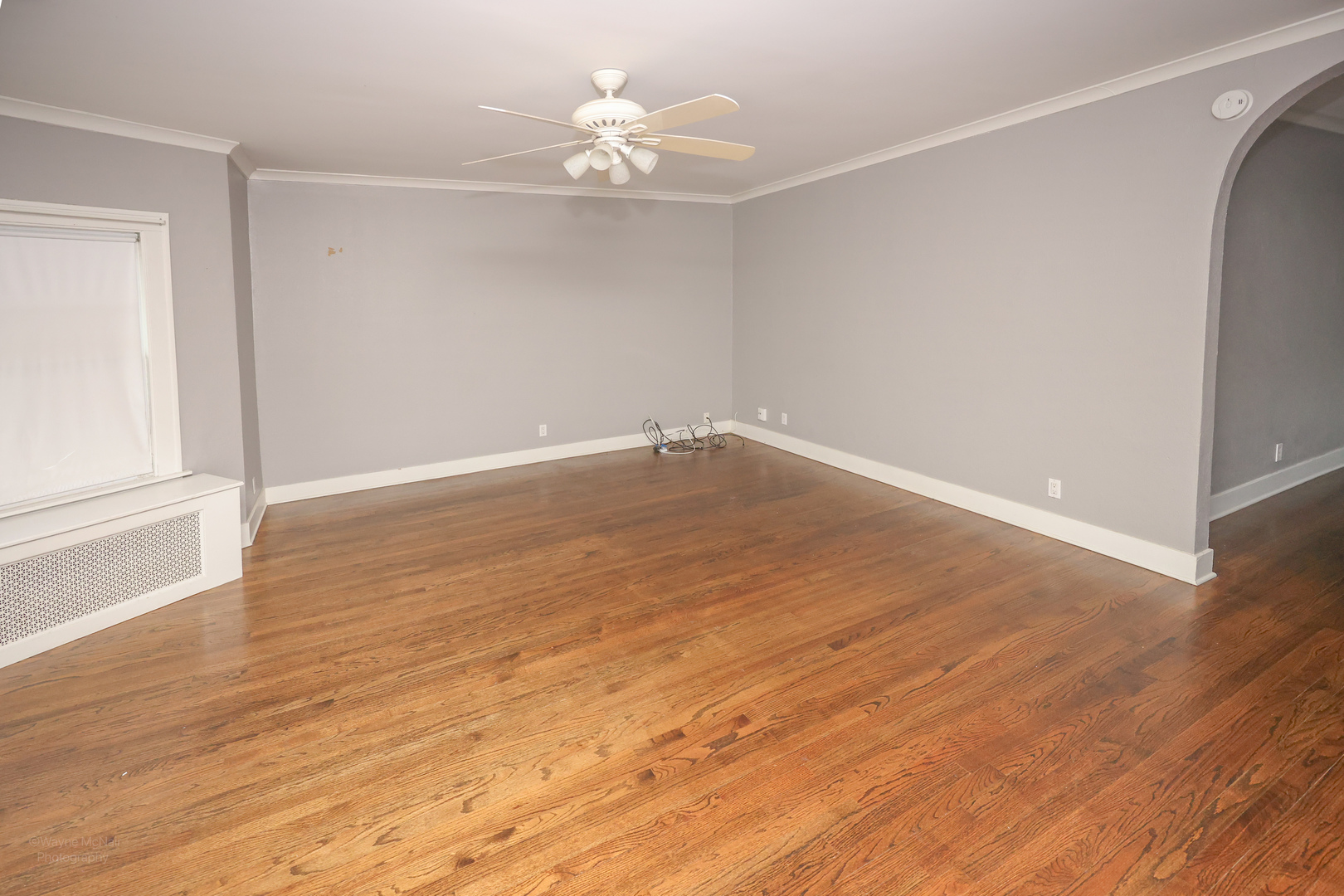 815 Mason Avenue, Unit 2 Joliet, IL 60435 - Photo 2 of 13 wooden floor in an empty room with a window