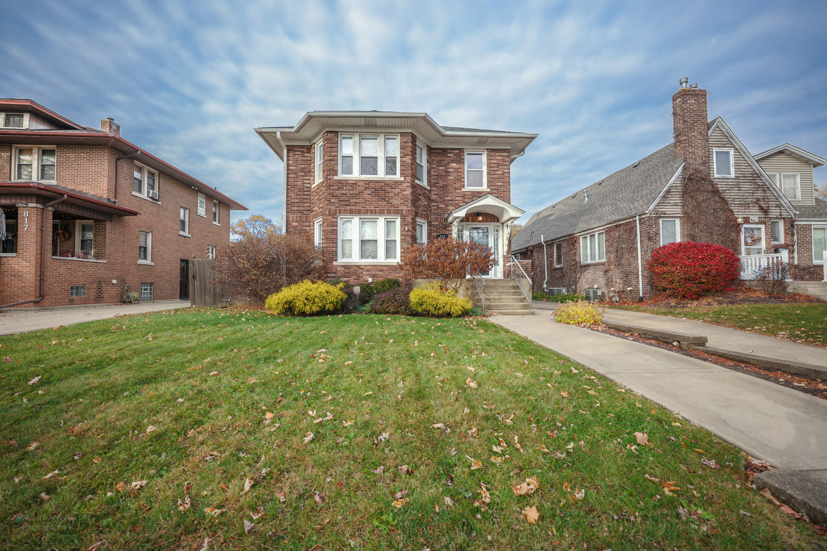 815 Mason Avenue, Unit 2 Joliet, IL 60435 - Photo 3 of 13 a front view of a house with garden