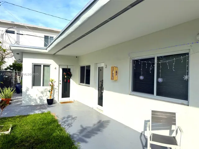a view of a entryway door front of house